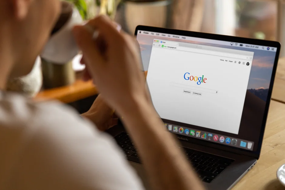 Close-up of a tablet displaying Googles search screen, emphasizing technology and internet browsing.